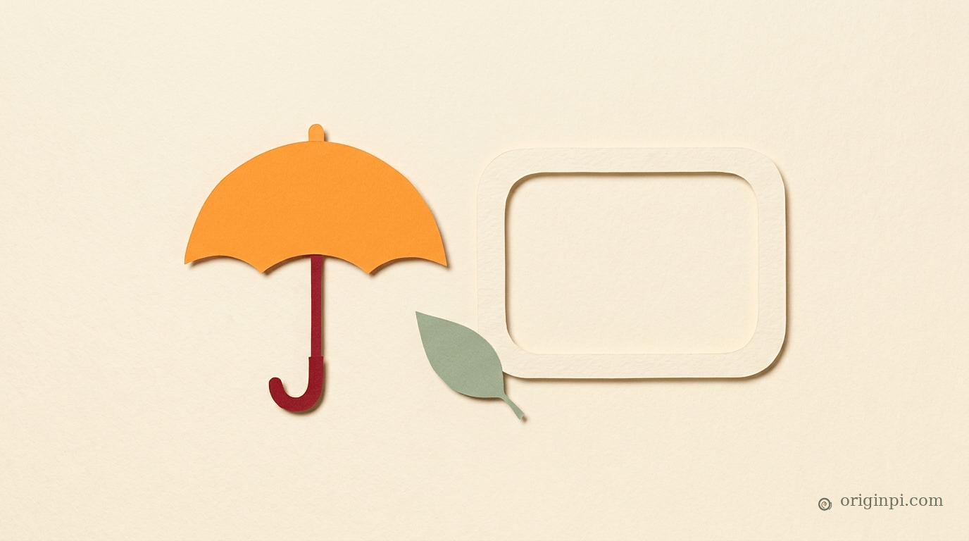 Paper cutout of an orange umbrella beside an empty rounded frame and a green leaf, on cream paper.